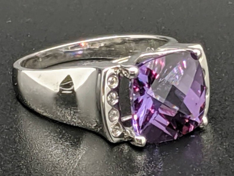 Size 7.25 US set in Sterling Silver with .12 CT Cubic Zirconia Accents 5.40 CT Alexandrite Ring