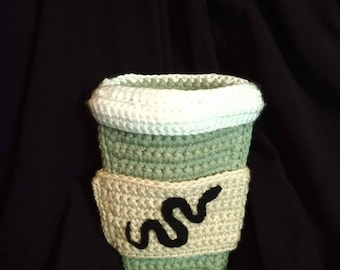 Handmade, crocheted 5" reptile pouch.