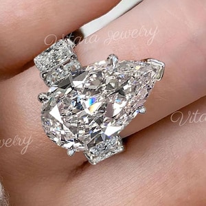 6.5CT ビッグペアモアッサナイトエンゲージリング、隠れたハロー、幅広バンド、セレブスタイルの大きなダイヤモンド、ペアシェイプリング、高級カクテルティアドロップリング