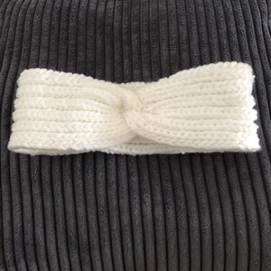 Twisted knitted handmade headband.