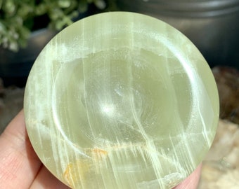 Green onyx egg smooth polished with stand.