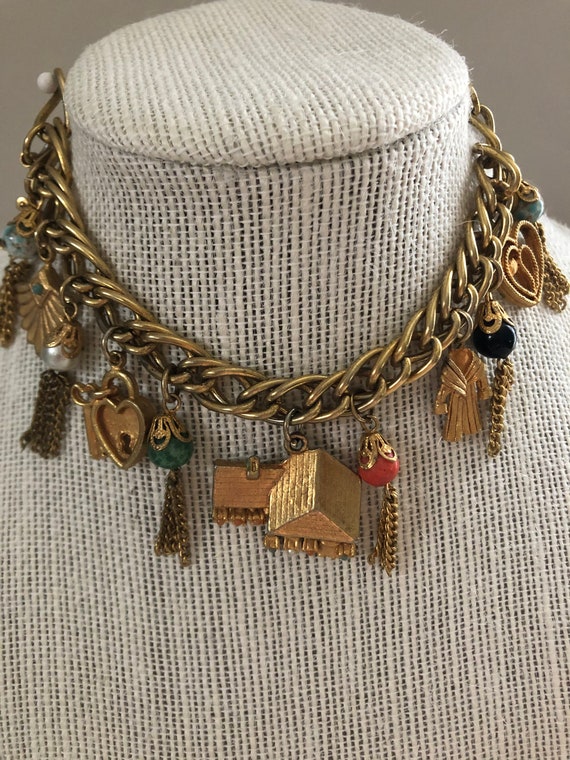1960's gold colored charm bracelet - image 1