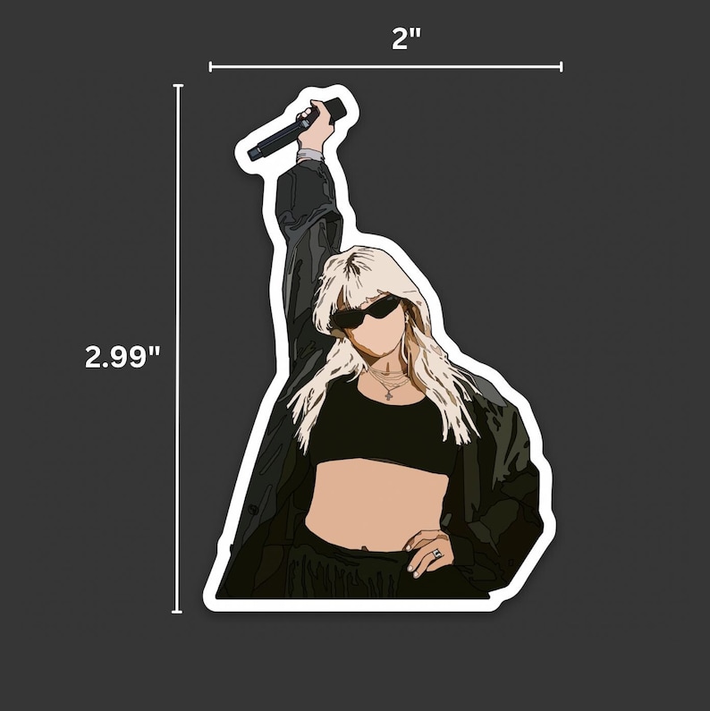 May include: A sticker of a person with blonde hair wearing sunglasses and a black crop top, holding a microphone. The person is wearing a black jacket and black pants. The sticker is 2 inches by 2.99 inches.