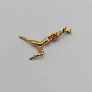 SUPER RARE gold plated french acrobat character necklace gold tones