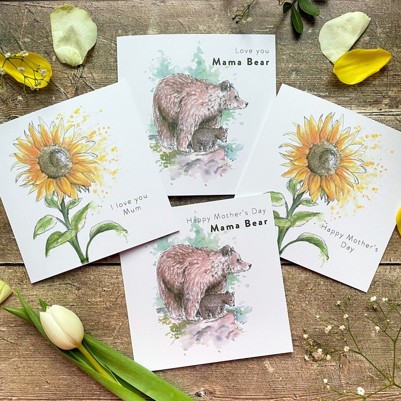 May include: Four greeting cards with watercolor illustrations of sunflowers and bears. The cards have different messages, including "Love you Mama Bear", "Happy Mother's Day Mama Bear", "I love you Mum", and "Happy Mother's Day".