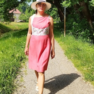 Upcycled refashioned altered repurpose dress remade from white floral printed reused second hand dress and pink viscose textile waste pieces