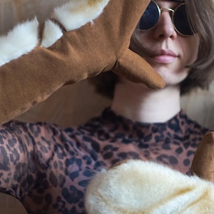 Upcycle warm long winter elbow mittens with bands made from textile waste and synthetic fur waste pieces. Brown and milk colour.