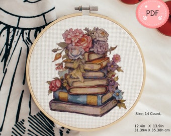 Peut inclure: Un motif de point de croix représentant une pile de livres surmontée d'un bouquet de fleurs roses, violettes et blanches. Le motif est réalisé sur une toile de 14 points et mesure 31,39 cm x 35,38 cm.