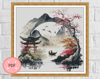 May include: A cross-stitch pattern featuring a Japanese-inspired landscape with a pagoda, cherry blossom trees, mountains, and a boat on a lake. The design is in shades of gray, black, white, and pink.
