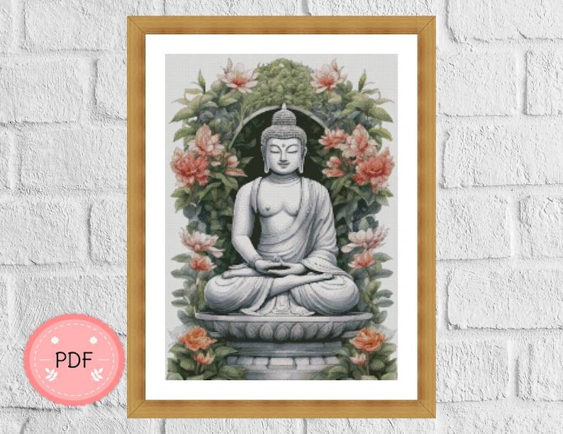 May include: A white Buddha statue sits in a meditative pose on a pedestal surrounded by pink flowers and green leaves. The statue is in a serene setting, with a soft, light background.