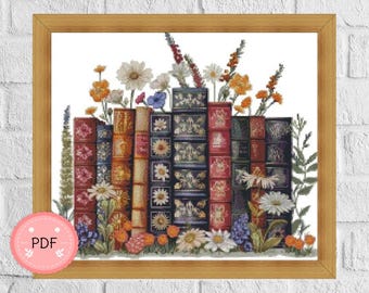 Puede incluir: Un patrón de punto de cruz que presenta una pila de libros antiguos con flores y vegetación coloridas que los rodean. Los libros tienen diseños intrincados y están dispuestos en una fila. Las flores son en tonos de rojo, amarillo, azul y blanco.