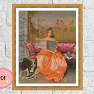 May include: A woman in a long orange dress sits on a pink sofa and reads a book. The sofa is in a room with a marble floor and a painting on the wall. The painting depicts three figures in a landscape.