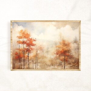 May include: A watercolor painting of a forest scene with trees in shades of orange, red, and brown. The trees are surrounded by a hazy, atmospheric background.