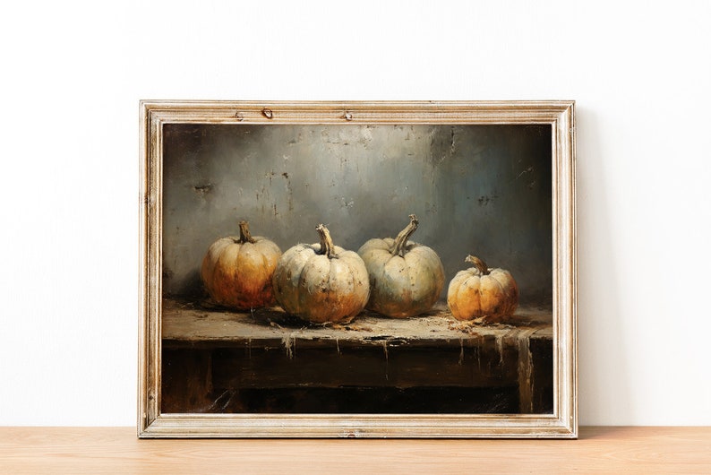 May include: A framed oil painting depicting a still life of four gourds on a wooden table. The gourds are various shades of beige and brown, and the table is weathered and worn. The background is a muted blue-gray.