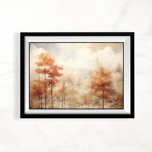 May include: A framed watercolor painting of a misty forest scene with trees in shades of orange and brown. The painting has a soft, dreamy feel.