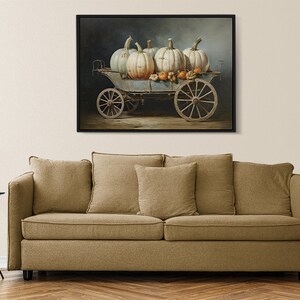 May include: A vintage wooden wagon filled with white pumpkins and small orange gourds. The wagon has black wheels and is set against a dark blue background.