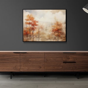 May include: A brown wooden dresser with six drawers and black metal legs. A framed painting of a foggy forest with orange trees hangs above the dresser. A black floor lamp with a black shade stands to the right of the dresser.