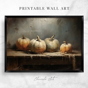 May include: A painting of four pumpkins on a wooden table with a textured gray background. The pumpkins are various shades of orange and green. The painting is framed in black.
