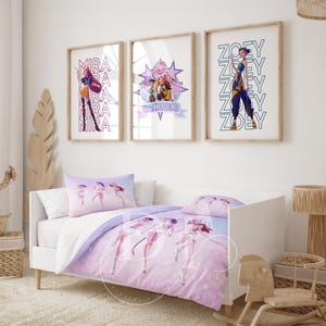 May include: A child's bedroom set featuring a white bed with a lavender and white comforter and pillow set. Above the bed are three framed prints with character illustrations and names. The room is decorated with a wooden cactus and a woven basket.