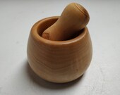 Small mortar and wooden pestle turned