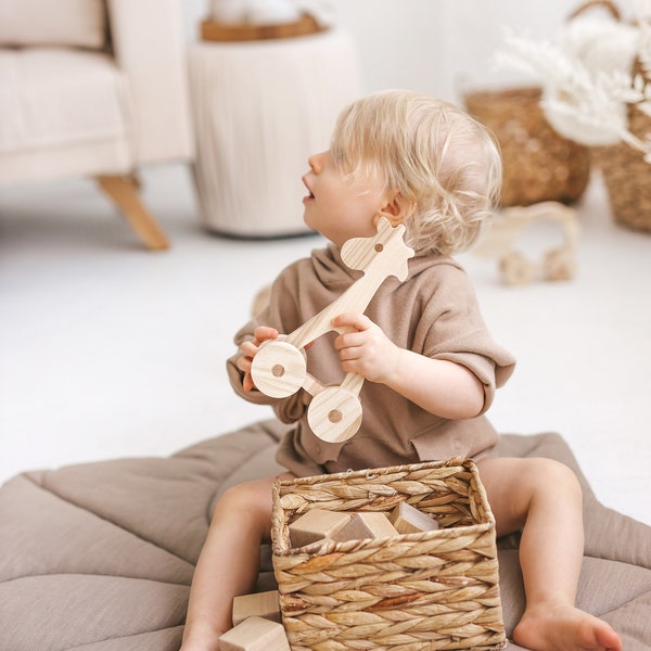 Natural wooden toy giraffe for toddlers from solid wood