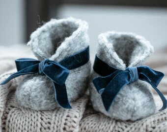 Blue woolen newborn shoes with eco leather pads for baby boy