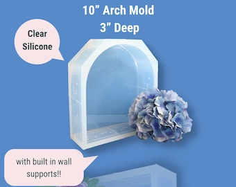 May include: Clear silicone mold for creating a 10 inch arch with a 3 inch depth. The mold has built-in wall supports.