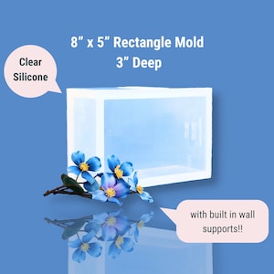 May include: Clear silicone rectangle mould, 8 inches by 5 inches and 3 inches deep. The mould has built-in wall supports.