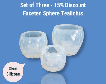 May include: Set of three clear silicone sphere tealight molds.  The molds are faceted and come in three sizes.  Set of Three - 15% Discount Faceted Sphere Tealights. Clear Silicone.