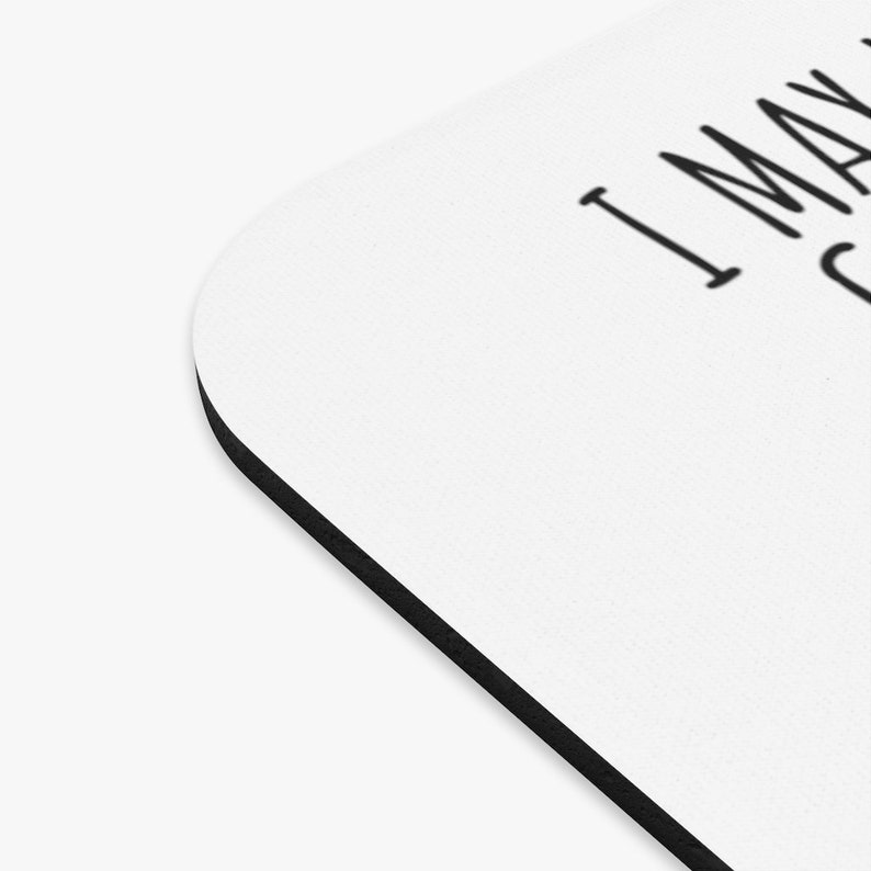 May include: White coaster with black text that reads "I may look calm but I'm about to unleash chaos".