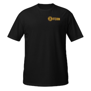 May include: Black t-shirt with a yellow Bitcoin logo on the front.