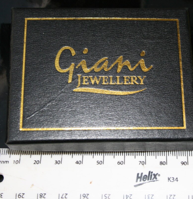 Really Nice Trinket. .A Small 10mm. Oval Cluster With Necklace by
