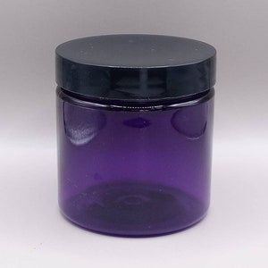 May include: A clear purple glass jar with a black lid. The jar is empty and ready to be filled with your favourite product.