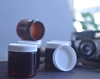 4oz Plastic Jar With White Ribbed unlined Lid