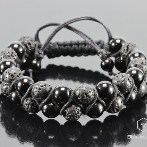 Crucible Jewelry Polished Stainless Steel Skull and Polished Black Onyx Strech Bracelet - Silver