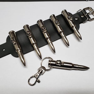 Leather bracelet and a key Chain with real recycled .308 caliber bullets and skull heads.Gothic Punk Biker jewelry