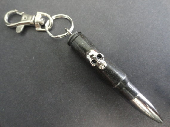 Key chain with real .308 caliber bullet and skull head stud