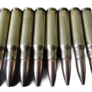 Belt Buckle made of 8 x .308 Caliber fired bullets riveted on a metal plate.Punk Gothic Heavy Metal Cosplay