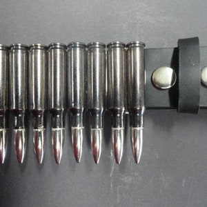 Belt Buckle made of 8 x .308 Caliber fired bullets riveted on a metal plate.Punk Gothic Heavy Metal Cosplay