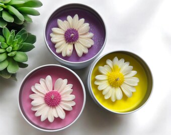 Daisy Tin Candle ~ Approx 25 Hour Burn Time ~ Soy Wax ~ Musk Sticks ~ Pink Champagne ~ Lemongrass & Lime ~ Japanese Honeysuckle ~ 8 oz