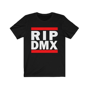 May include: Black short-sleeved t-shirt with a white graphic that says "RIP DMX" in a red box.