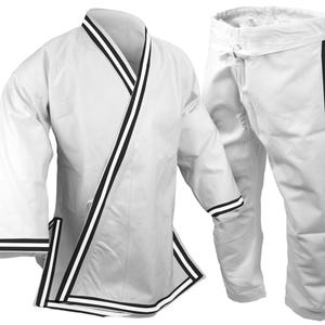 May include: A white martial arts uniform, consisting of a jacket and pants. The jacket has a V-neck with black and white trim, and the pants have a black stripe down the side. The uniform is made of a lightweight fabric.