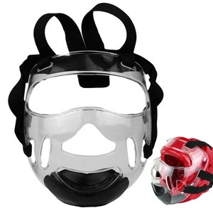 May include: Clear plastic face guard with black padding and straps. The guard has a curved design to protect the face and is shown with a smaller red face guard.