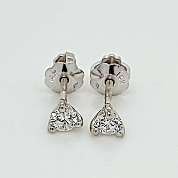14 Karat White Gold Pair Stud Earrings With Backings Round