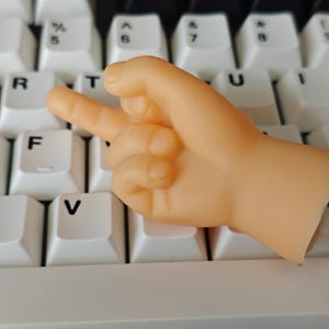 Hilarische Tiny Hands-vingerset: grapcadeau voor grappenmakers