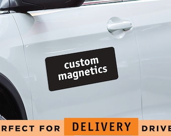 May include: A white car with a black rectangular magnet on the side that says "custom magnetics".