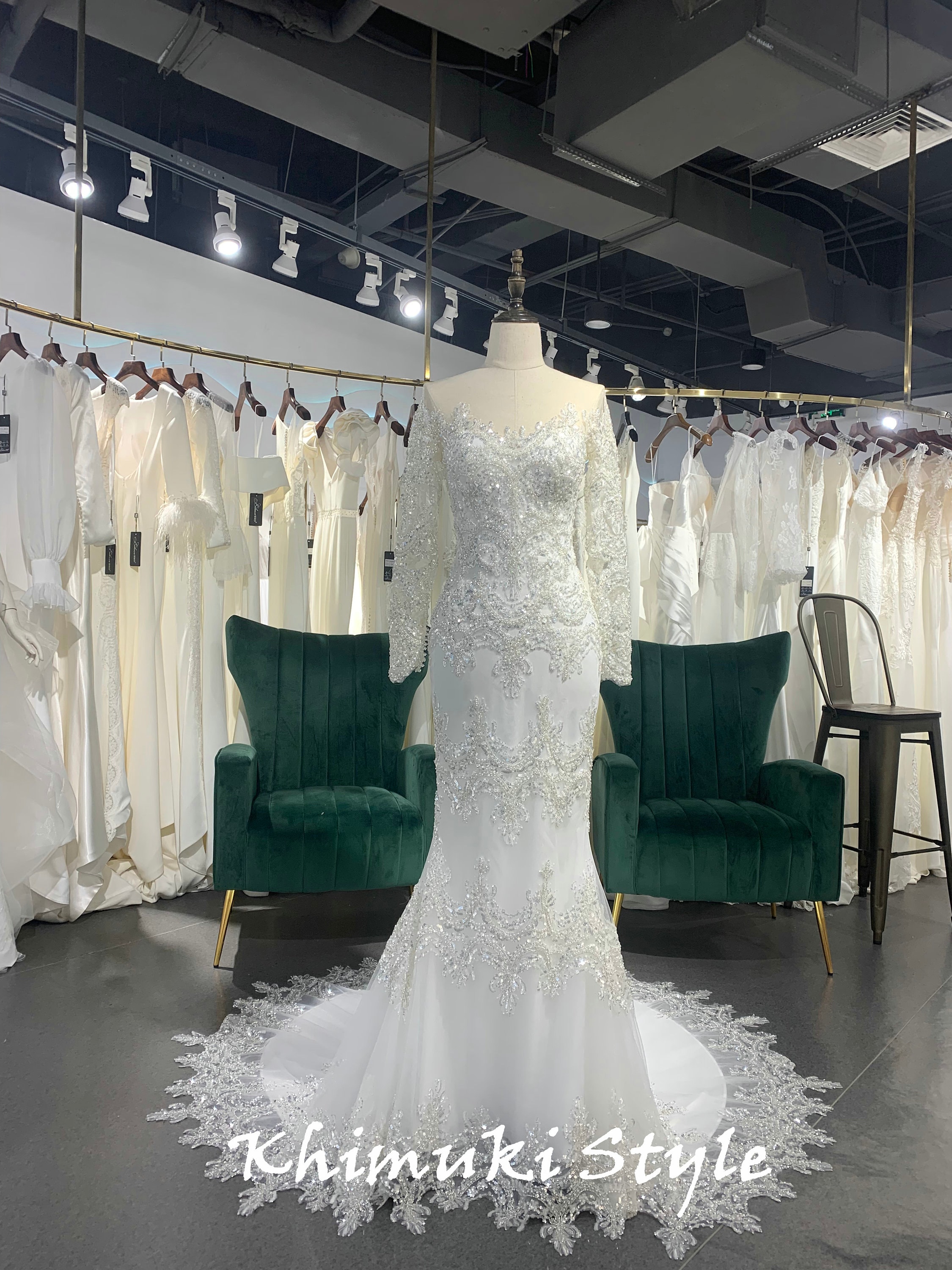 Vestido de noiva sereia de manga comprida com renda e miçangas
