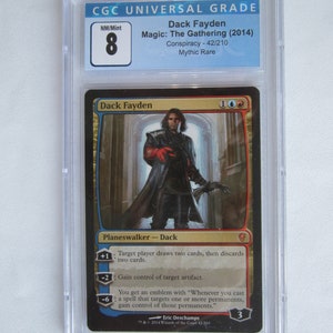May include: A blue and gold Magic: The Gathering card featuring Dack Fayden, a planeswalker. The card has a blue border and a gold background. The card text reads "Dack Fayden" and "Planeswalker - Dack". The card has a power of 3 and a toughness of 3.