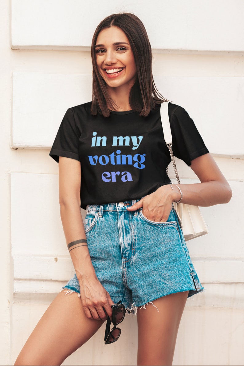 In My Voting Era Shirt Funny Anti Trump Joe Biden Democrat Trump Sucks 2024 Election Democrat Feminist Fuck The Patriarchy BLACK/BLUE