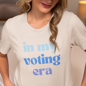 In My Voting Era Shirt Funny Anti Trump Joe Biden Democrat Trump Sucks 2024 Election Democrat Feminist Fuck The Patriarchy SOFT CREAM/BLUE